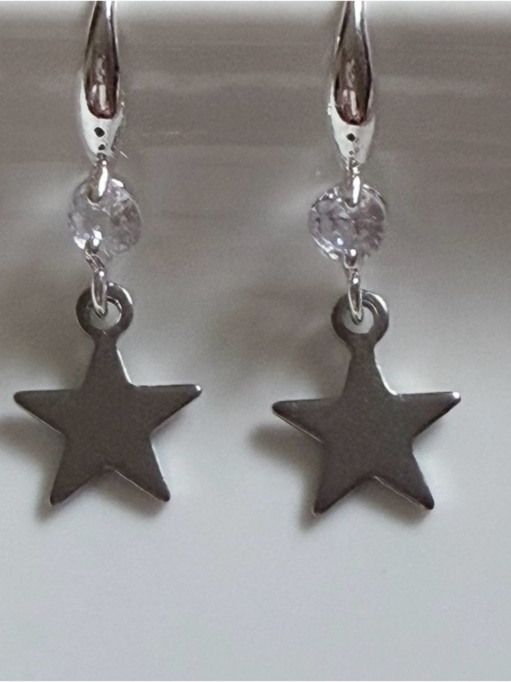 Stainless Steel Silver Star Drop Earrings with Clear Crystal Accent